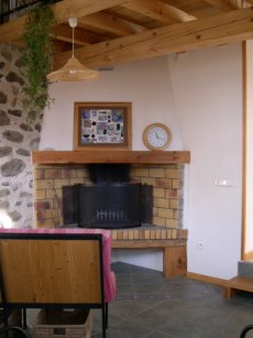La Banquette et la Cheminee du gite